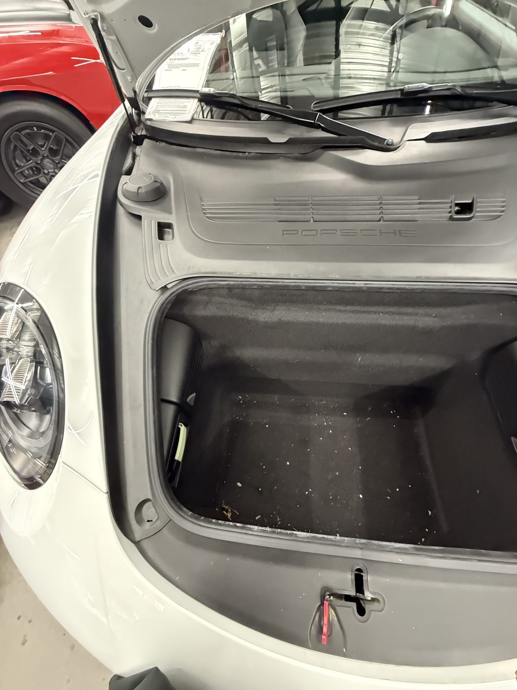 Porsche front trunk before detailing