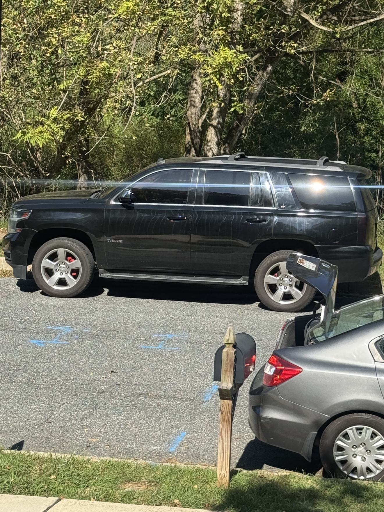 Chevy Tahoe before detailing — dull, water-spotted paint